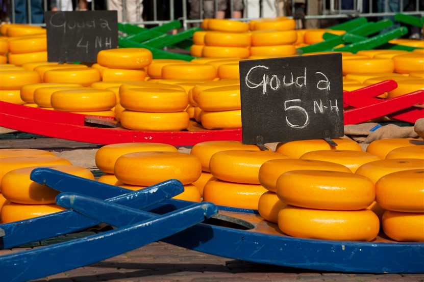 <img src="gouda_alkmaar_cheesemarket_shutterstock_61684819.jpeg" alt="Gouda Cheeses at Alkmaar">