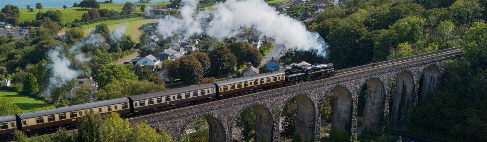 <img src="dartmouthsteamtrain3©shutterstock.jpeg" alt="Dartmouth Steam Train"/>