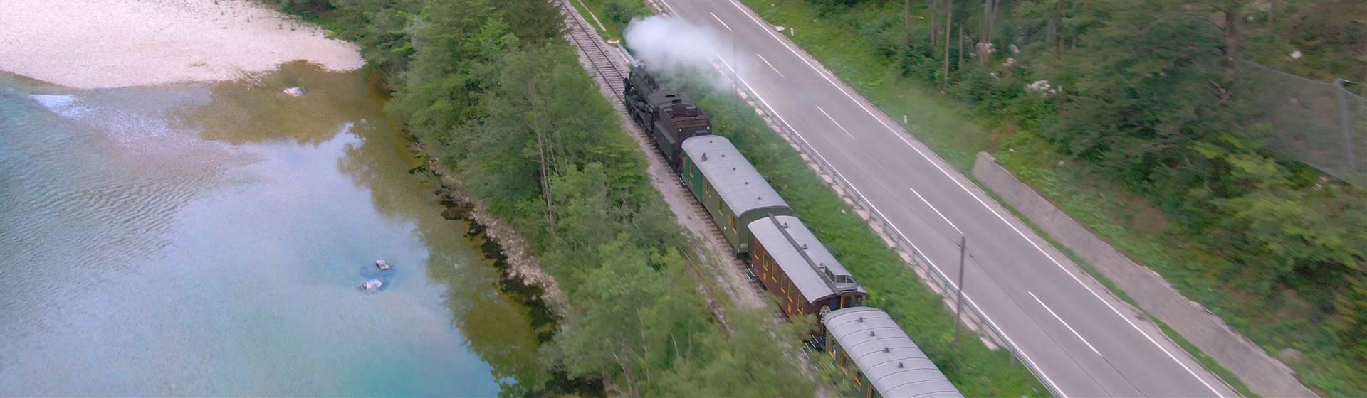 <img src="sloveniascenicrailwaytrainmountains©dreamstime.jpeg" alt="Solvenia Scenic Railway"/>