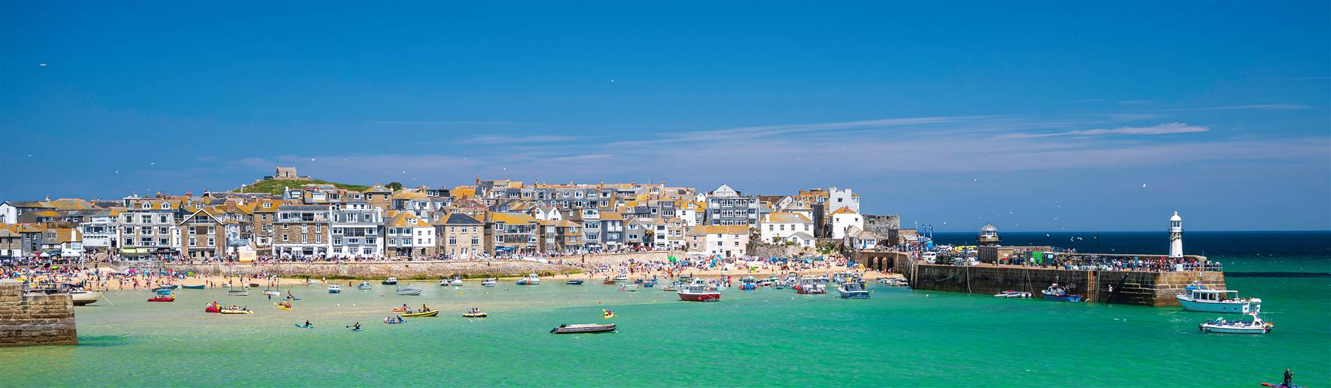 <img src="stives©adobestock.jpeg" alt=St Ives Beach"/>