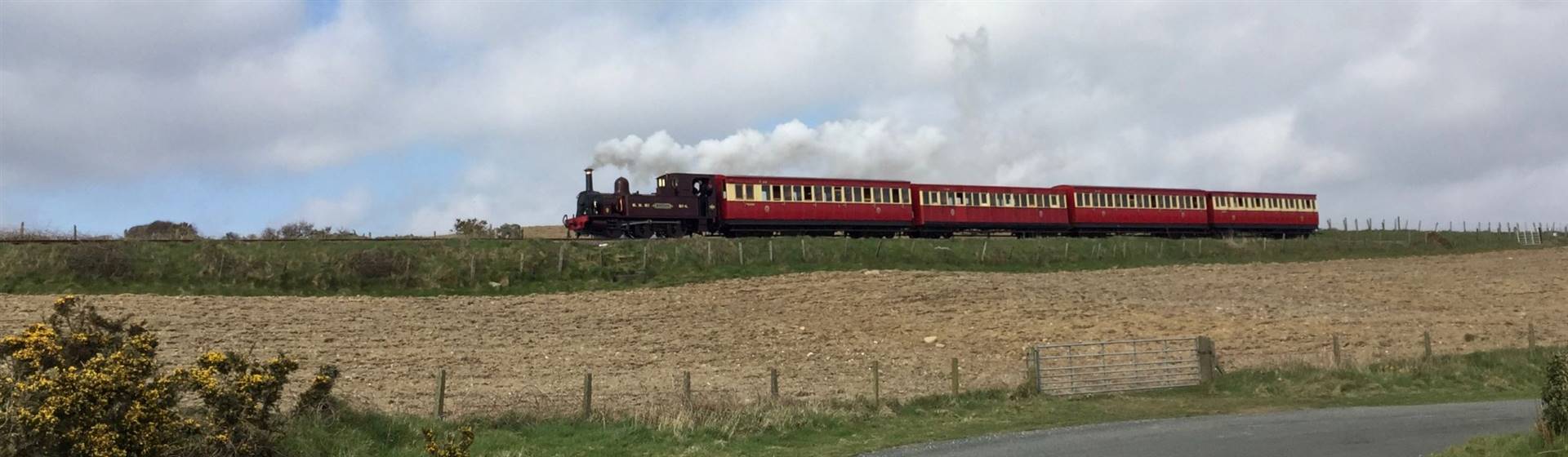 <img src=iisleofmanrailway-shutterstock.jpeg" alt="Isle of Man Railway"/>