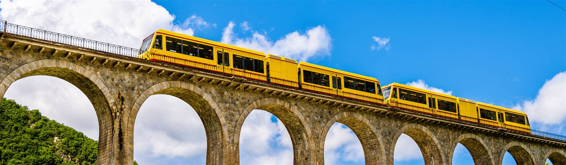<img src="trainjaune©leonidandronov-shutterstock.jpeg" alt="The Yellow Train"/>